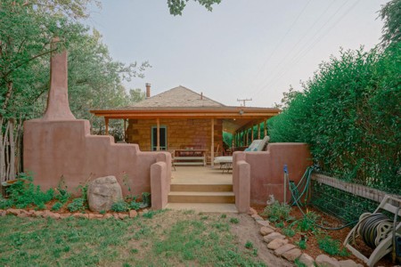 Stone Bungalow with beautiful courtyard and Kiva fireplace for sale in La Veta, Colorado